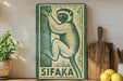 a green and white sign with a monkey illustration, placed on a wooden surface next to a wooden cutting board and some lemons.
