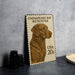 A metal stamp featuring a brown Chesapeake Bay Retriever dog, with the text "CHESAPEAKE BAY RETRIEVER" and "USA 20c" printed on it.