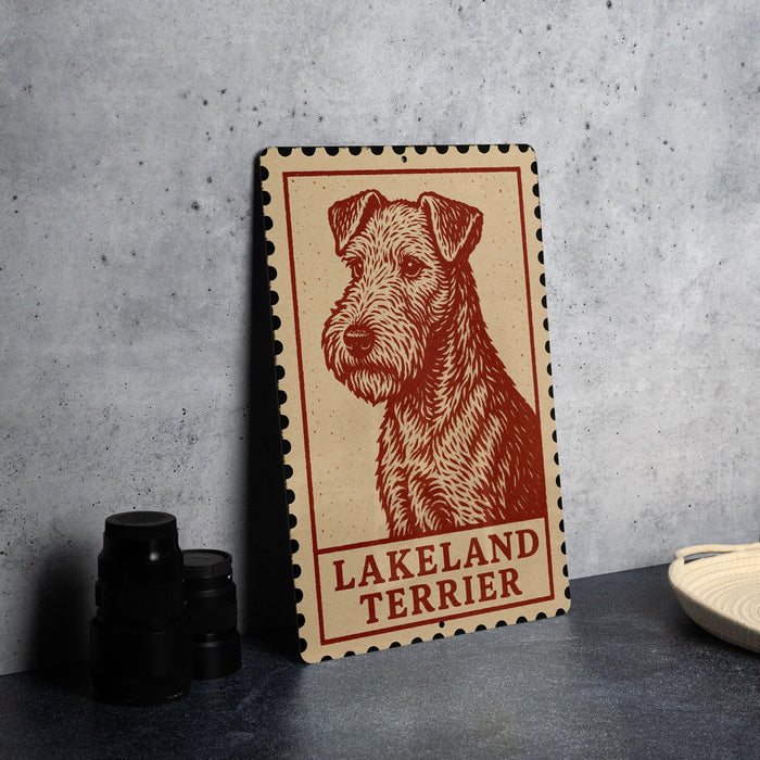 A framed poster of a Terrier dog, specifically a Lakeland Terrier, is displayed on a wall.