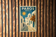 A vintage-style postage stamp depicting a Greek street scene with a church, sun, and orange flowers.