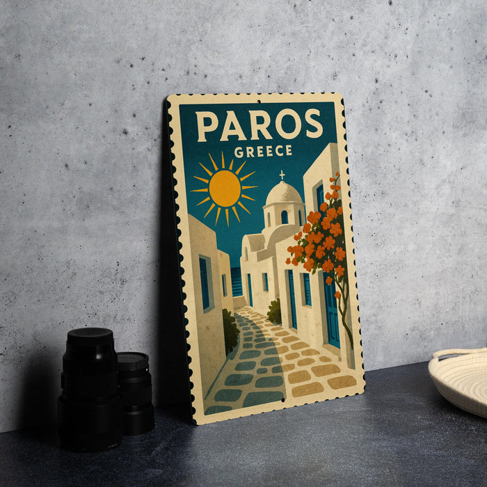 A vintage-style postage stamp depicting a street scene in Paros, Greece, with a church and a sun in the background.