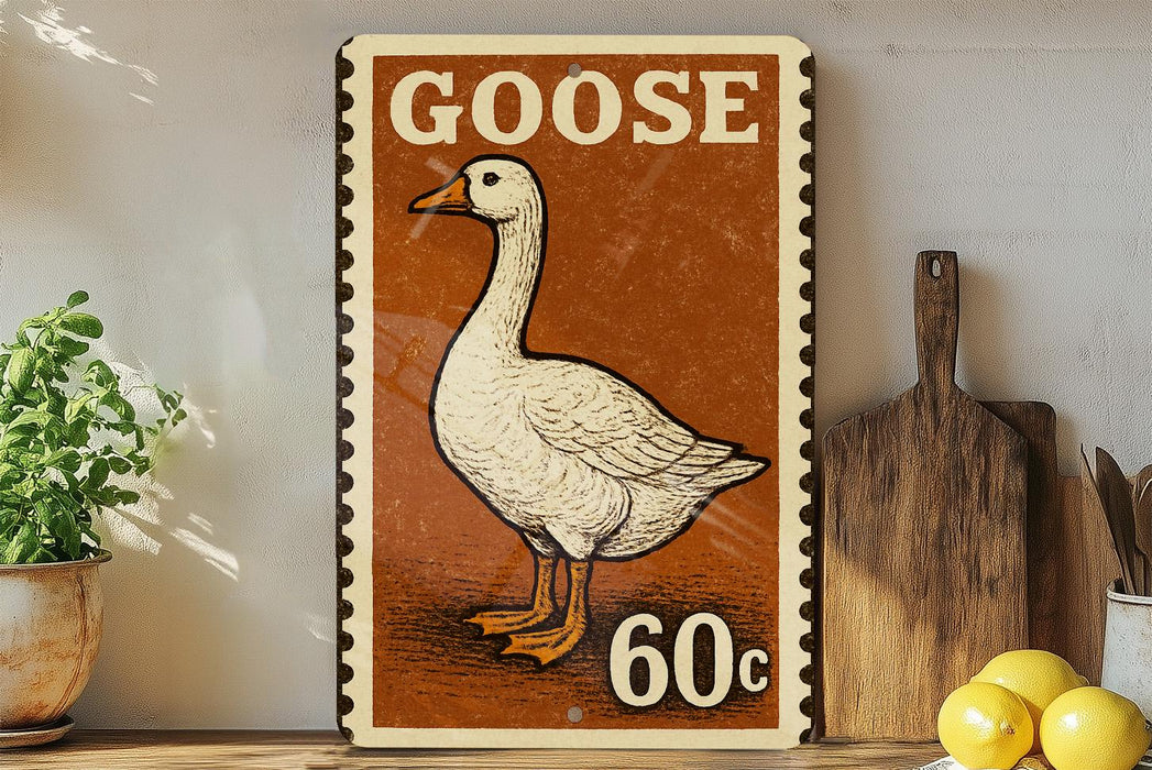 A vintage-style metal sign featuring a cartoon goose, with the text "GOOSE 60c" printed on it. The sign is displayed on a shelf next to a wooden cutting board and a potted plant.