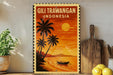A vintage-style poster of a tropical beach scene with palm trees, a boat, and a sunset over the ocean, displayed on a wall next to a wooden cutting board and a potted plant.
