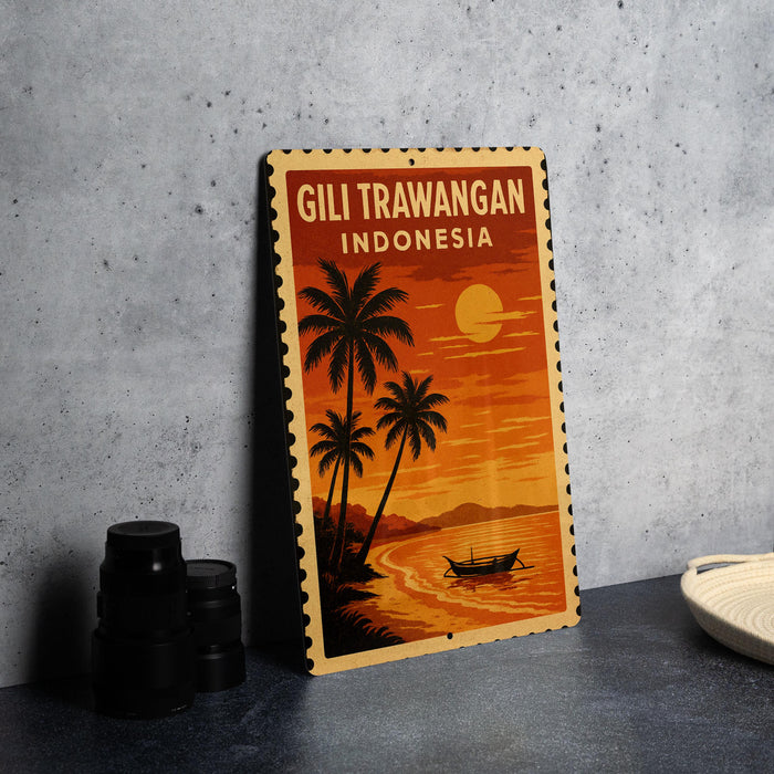 A vintage-style metal sign with a tropical beach scene and palm trees, featuring the text "Gili Trawangan Indonesia" against an orange and yellow sunset backdrop.