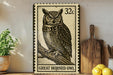 A framed stamp-like artwork depicting a great horned owl, with the text "GREAT HORNED OWL" below the image.