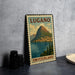 A vintage-style metal sign depicting the town of Lucano, Switzerland, with a mountain in the background and a body of water in the foreground.