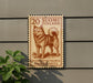 a large, brown, rectangular sign with a picture of a dog on it, mounted on a wall.