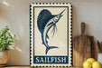 a blue and white sign with a sailfish illustration, placed on a wooden surface next to a wooden cutting board and some lemons.
