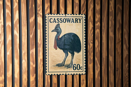 A postage stamp featuring a black bird, likely a cassowary, with the text "CASSOWARY 60c" printed on it.