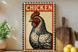 a vintage-style sign with a rooster illustration, placed on a wooden surface next to a wooden cutting board and some lemons.