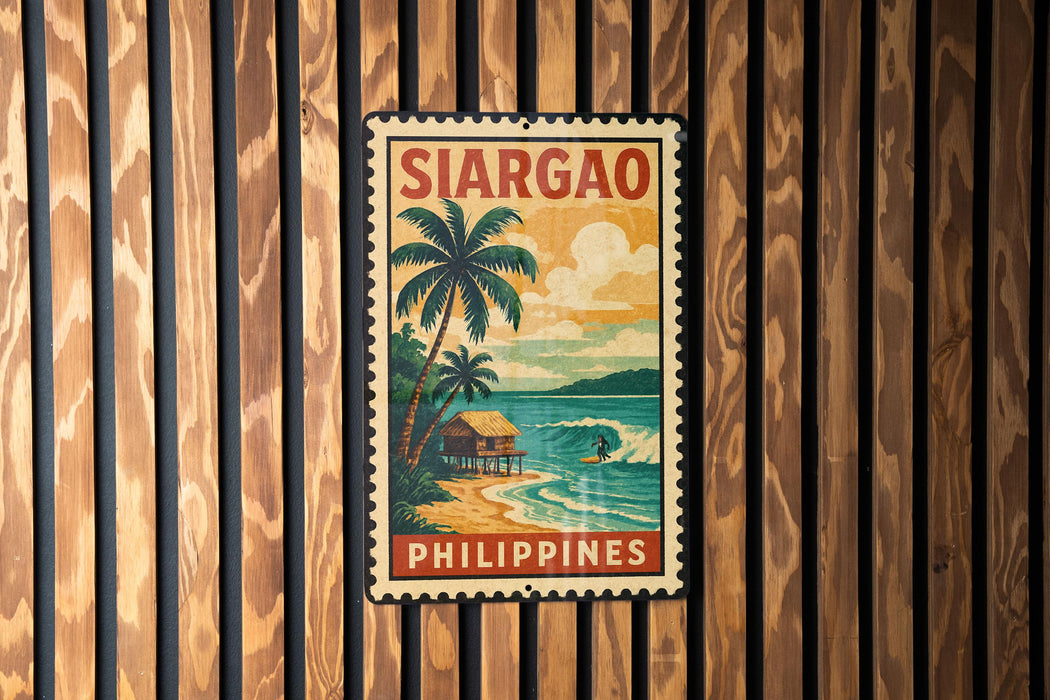 A vintage-style poster of Sargao, a tropical island in the Philippines, is displayed on a wooden wall.