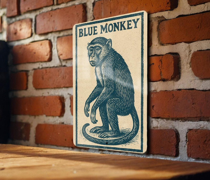A metal sign featuring a blue monkey is mounted on a brick wall.