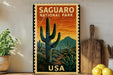 A vintage-style poster of Saguaro National Park in the United States, featuring a cactus landscape with mountains in the background.