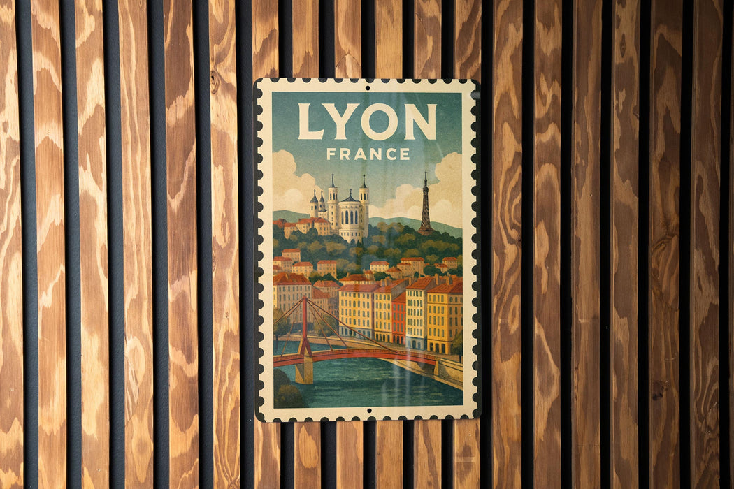 A vintage-style postage stamp from Lyon, France, featuring a cityscape with a bridge and a castle, hanging on a wooden wall.