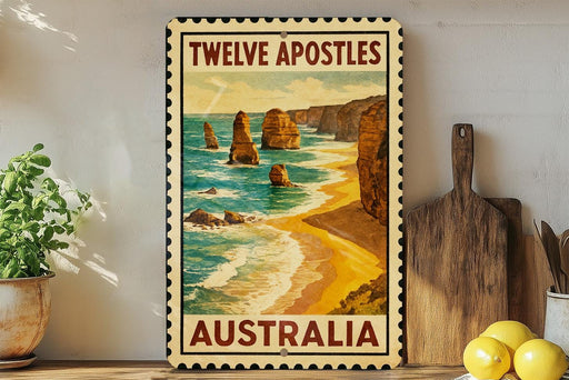 A framed poster of the Twelve Apostles, a famous rock formation in Australia, is displayed on a wall next to a wooden cutting board and a potted plant.
