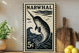 A black and white poster of a narwhal, a type of whale, is displayed on a wall next to a wooden cutting board and some lemons.