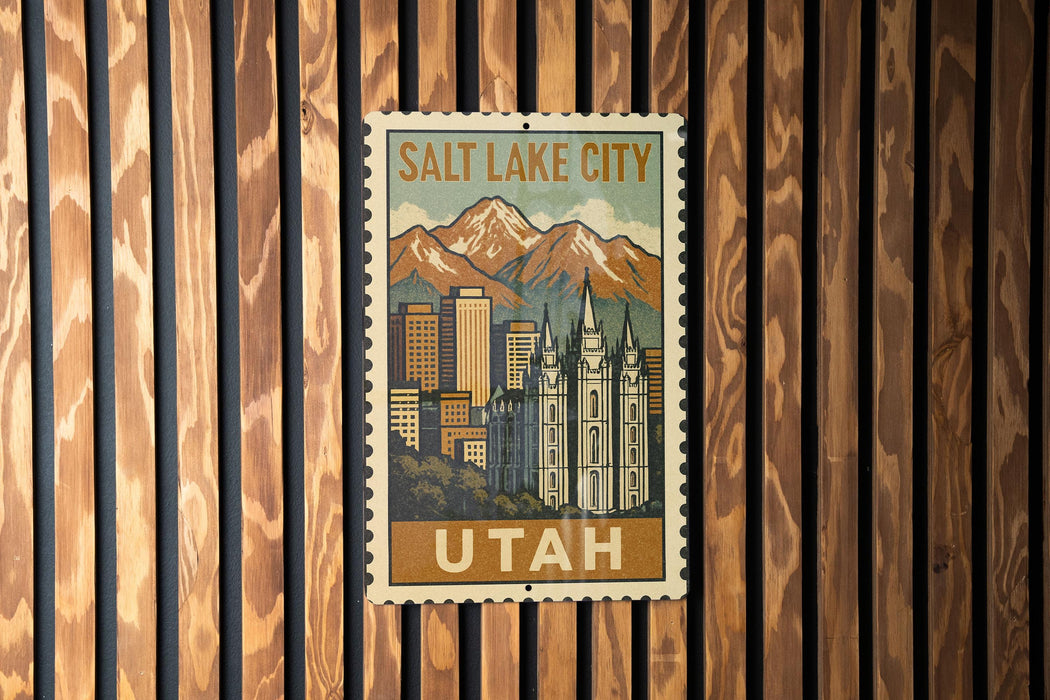A vintage-style postage stamp depicting Salt Lake City, Utah, with a mountain range in the background.