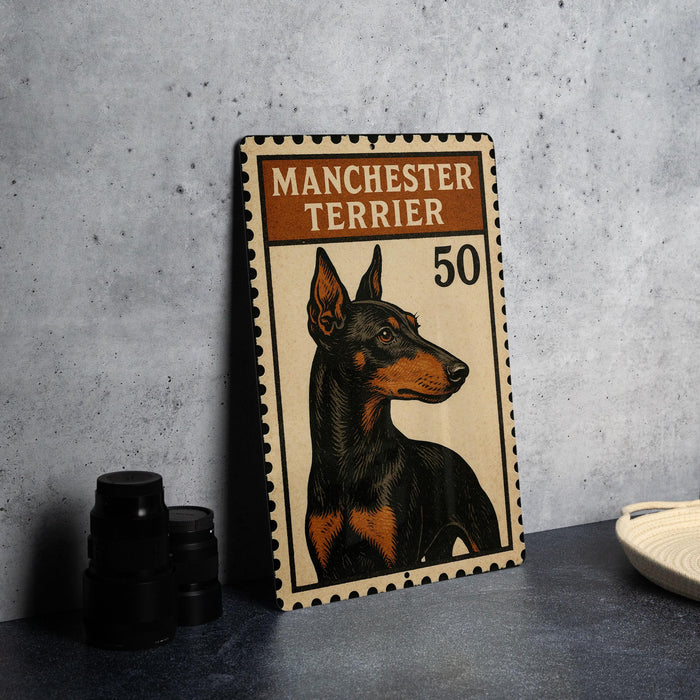 A metal sign featuring a Manchester Terrier dog, with the text "MANCHESTER TERRIER" and the number "50" printed on it.