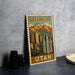 A framed poster of Salt Lake City, Utah, featuring a mountain range and cityscape.