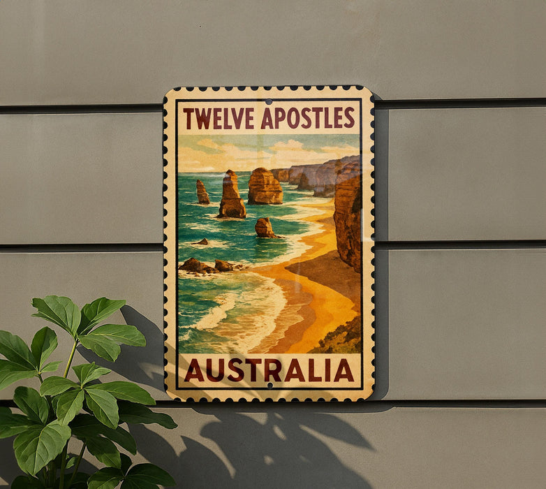 A vintage-style poster of the Twelve Apostles, a famous rock formation in Australia, is displayed on a wall.