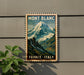 A vintage-style metal sign with a mountain landscape and the text "MONT BLANC FRANCE ITALY" is displayed on a wall.