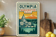 A framed poster of the Washington State Capitol in Olympia, Washington, U.S.A., with a mountain in the background.