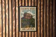 A postage stamp featuring the Sigiriya Rock, a famous landmark in Sri Lanka.