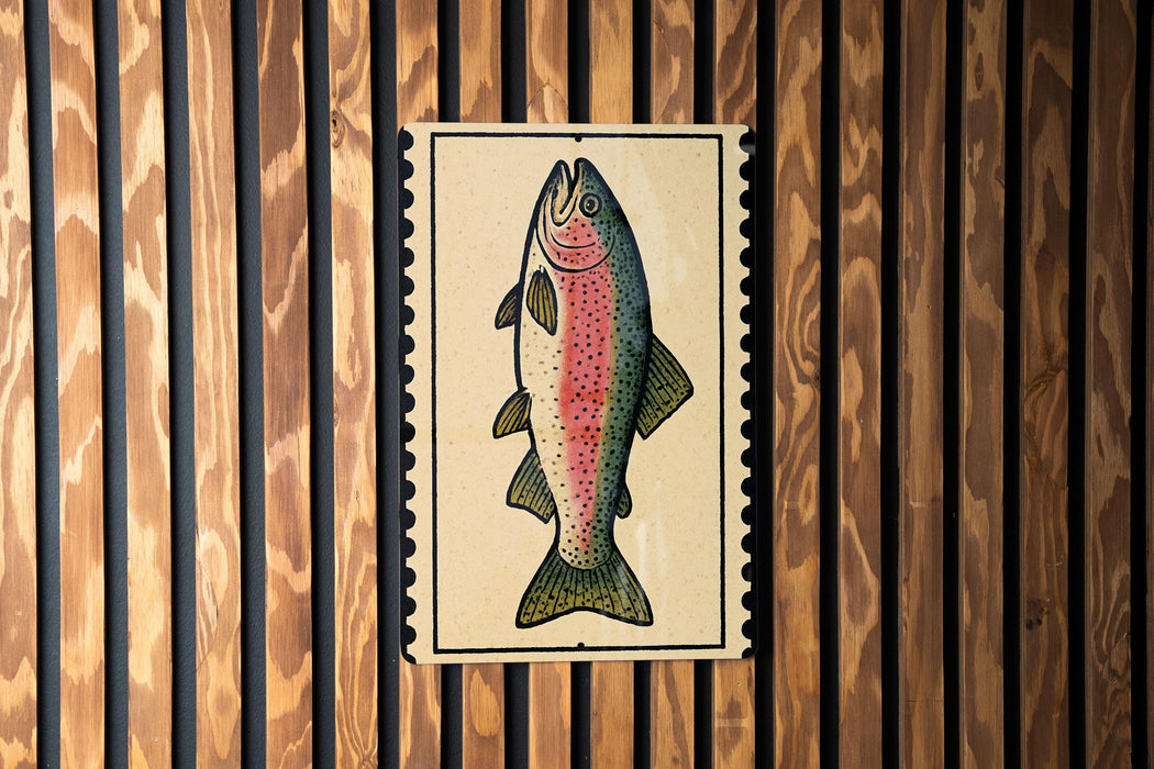 a colorful fish illustration on a wooden background.