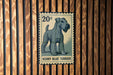 A 20 cent postage stamp featuring a picture of a Kerry Blue Terrier dog.