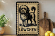 A framed illustration of a dog, specifically a Löwchen, is displayed on a shelf next to a wooden cutting board and some kitchen utensils.