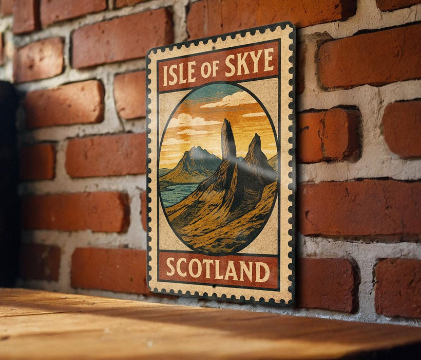 A vintage-style metal sign with the text "ISLE OF SKYE SCOTLAND" and an illustration of a mountainous landscape, mounted on a brick wall.