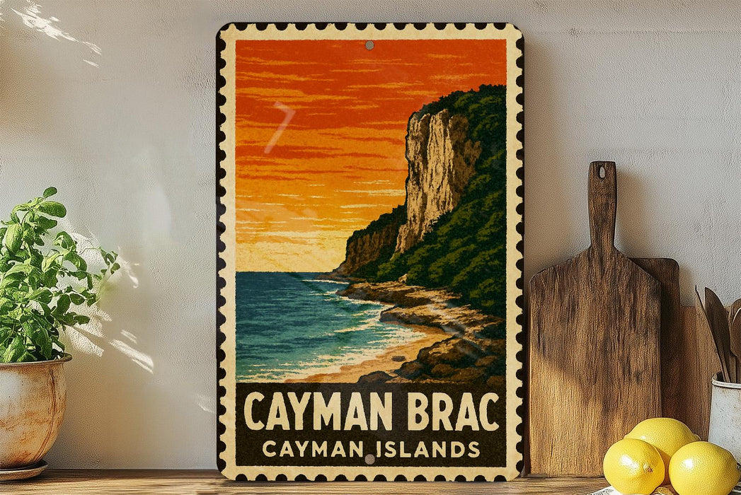 A vintage-style metal sign depicting a tropical beach scene with a cliff overlooking the ocean, surrounded by lush greenery and a warm sunset.