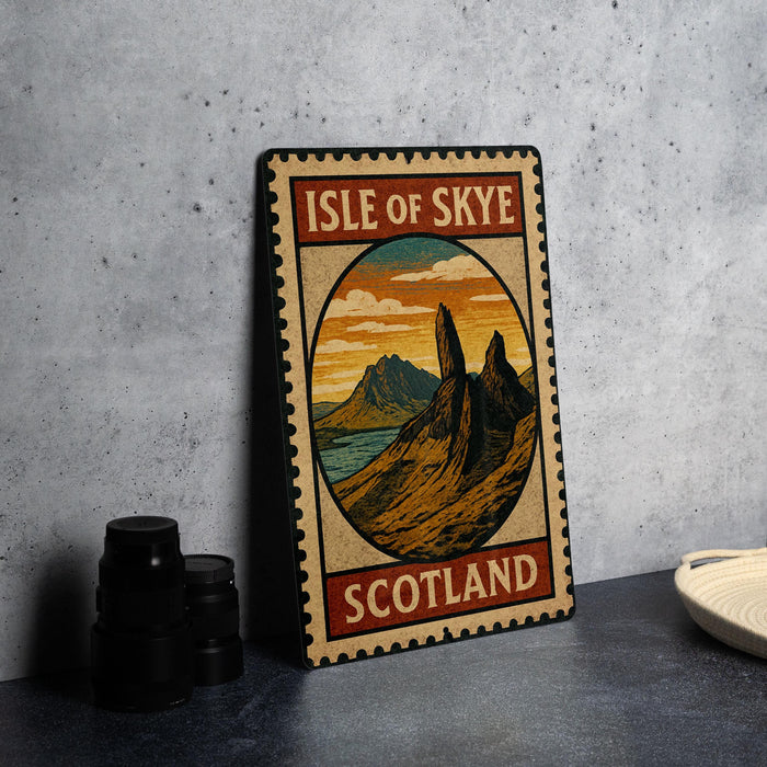 A framed poster of the Isle of Skye, Scotland, featuring a scenic landscape with mountains and a sunset.