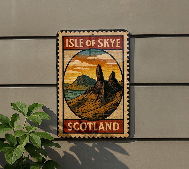 A vintage-style metal sign with the text "ISLE OF SKYE SCOTLAND" and an illustration of a mountainous landscape, mounted on a wall.