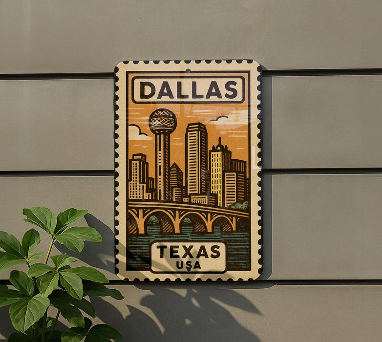 A decorative metal sign with a stylized illustration of the Dallas skyline and a bridge, mounted on a wall.