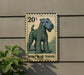 A 20c postage stamp featuring a picture of a Kerry Blue Terrier dog.