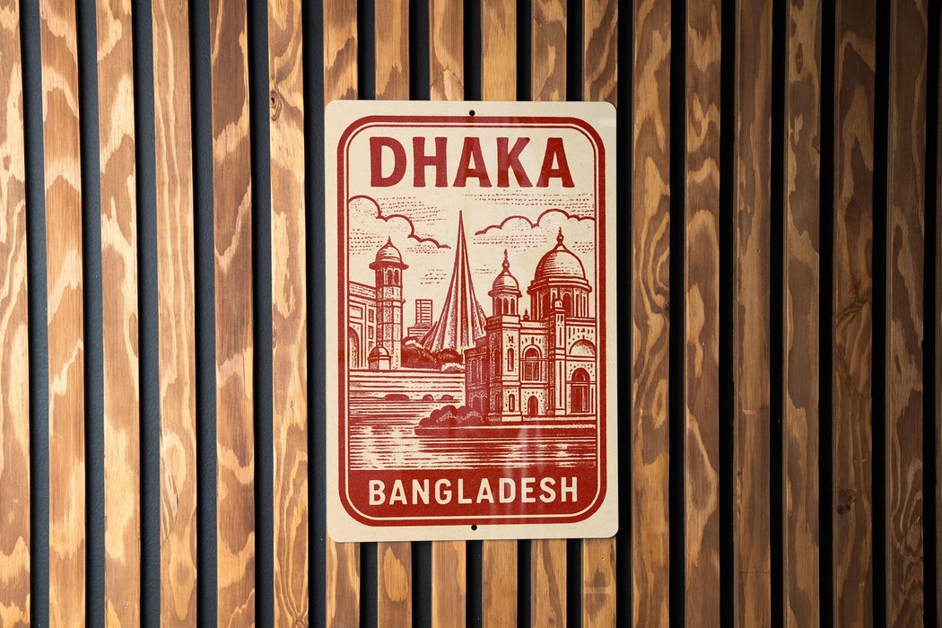 A sign displaying the name "Dhaka" and the word "BANGLADESH" in a stylized design, mounted on a wooden wall.