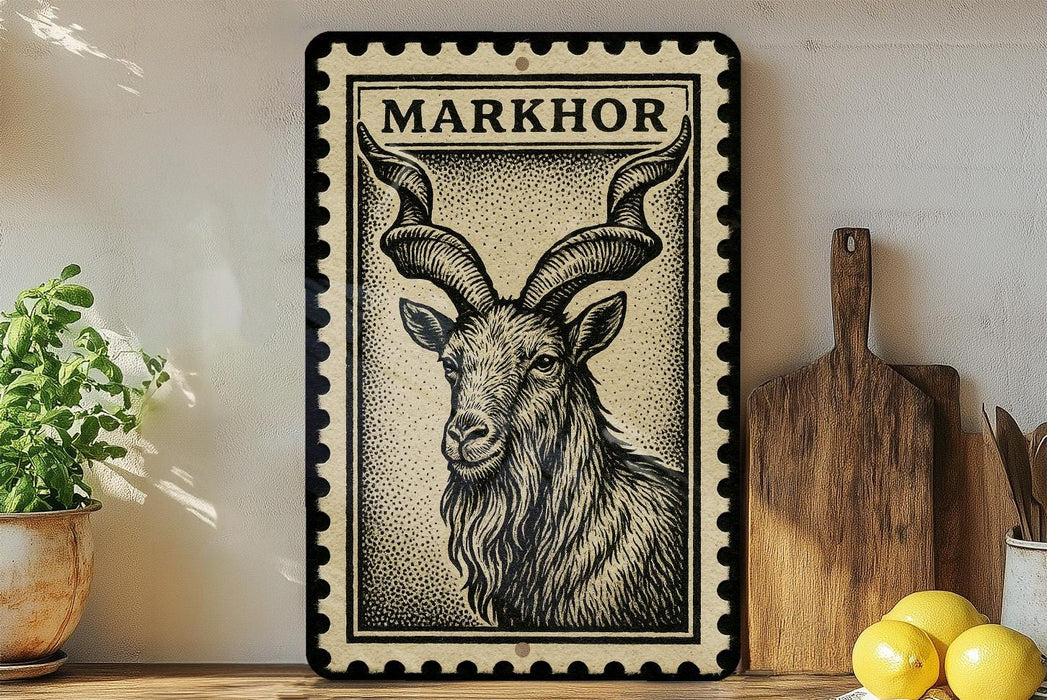a framed illustration of a horned goat, with a wooden cutting board and a potted plant in the background.