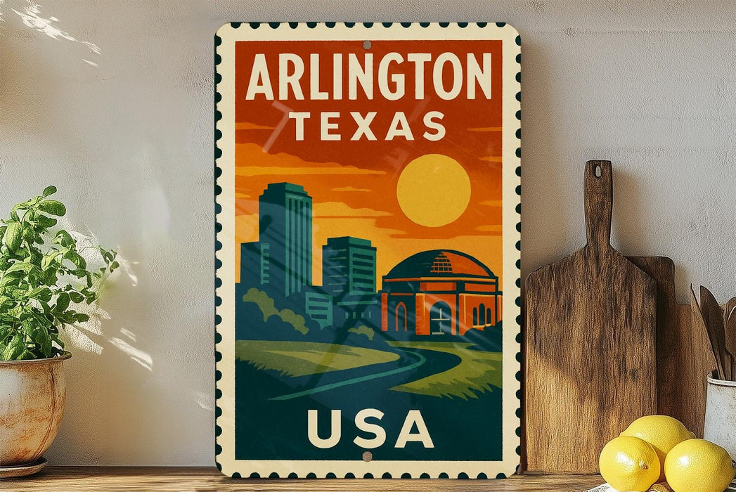 A vintage-style metal sign with the text "ARLINGTON TEXAS USA" displayed on it, featuring an illustration of a city skyline and a sun.