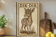 a wooden sign with a deer illustration, placed on a shelf next to a potted plant and a cutting board.