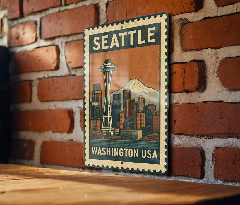 A vintage-style metal sign with the text "SEATTLE WASHINGTON USA" and an illustration of the Space Needle, mounted on a brick wall.