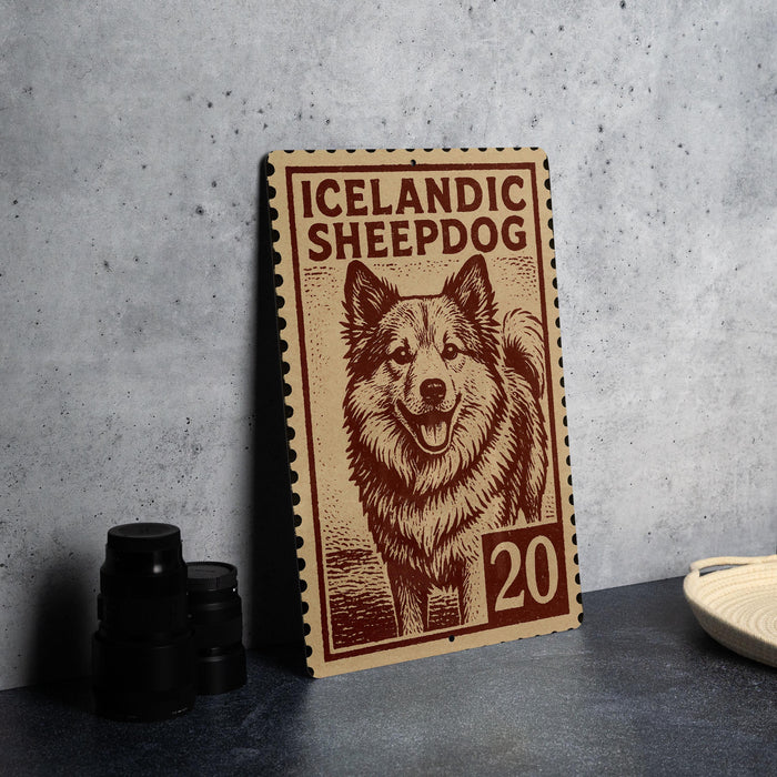 A wooden postcard featuring an illustration of a sheepdog, with the text "ICELANDIC SHEEPDOG" and the number "20" printed on it.