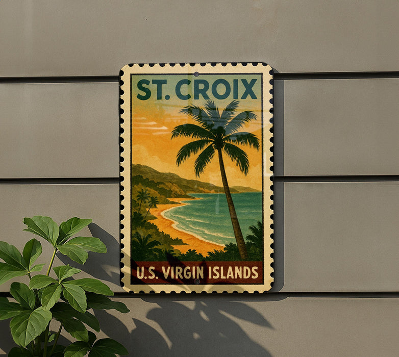 A vintage-style postage stamp depicting a tropical beach scene with palm trees and a sunset over the ocean, mounted on a wall.