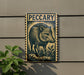 a wooden plaque with a detailed illustration of a wild boar, mounted on a wall.
