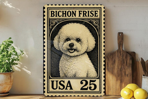 A vintage-style metal stamp featuring a Bichon Frise dog, with the text "BICHON FRISE" and "USA 25" printed on it. The stamp is placed on a wooden surface, surrounded by various kitchen items such as a wooden cutting board, a lemon, and a potted plant.