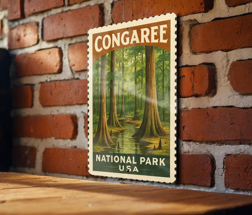 A vintage-style postage stamp depicting a lush forest scene, mounted on a brick wall.