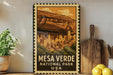 A framed vintage-style poster of the mesa terraces in the National Park of Mexico, with a wooden cutting board and a potted plant to the side.