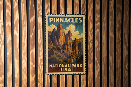 A vintage-style poster of Pinnacles National Park in the USA, featuring a scenic mountain landscape.