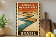 A vintage-style metal sign with the text "LENCÔIS MARANHENSES BRAZIL" displayed on a wall, with a desert landscape and a river depicted on the sign.