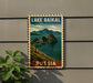 A vintage-style postage stamp depicting Lake Baikal, the world's largest cave system, with mountains and a lake in the background.